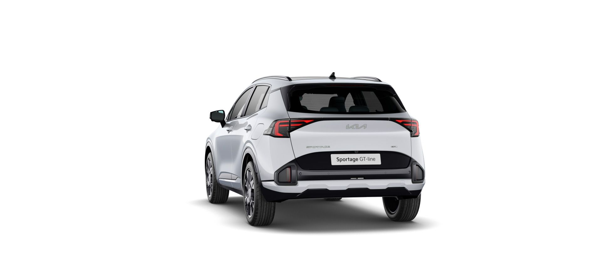 Vista trasera del Kia Sportage blanco con el faro combinado trasero y el alerón de techo