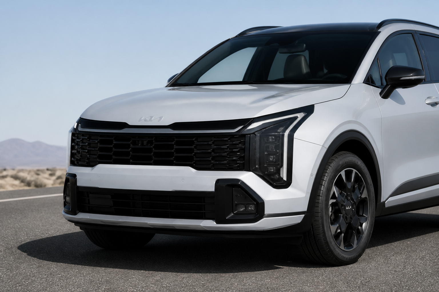 Frontal del Kia Sportage de día con los faros apagados