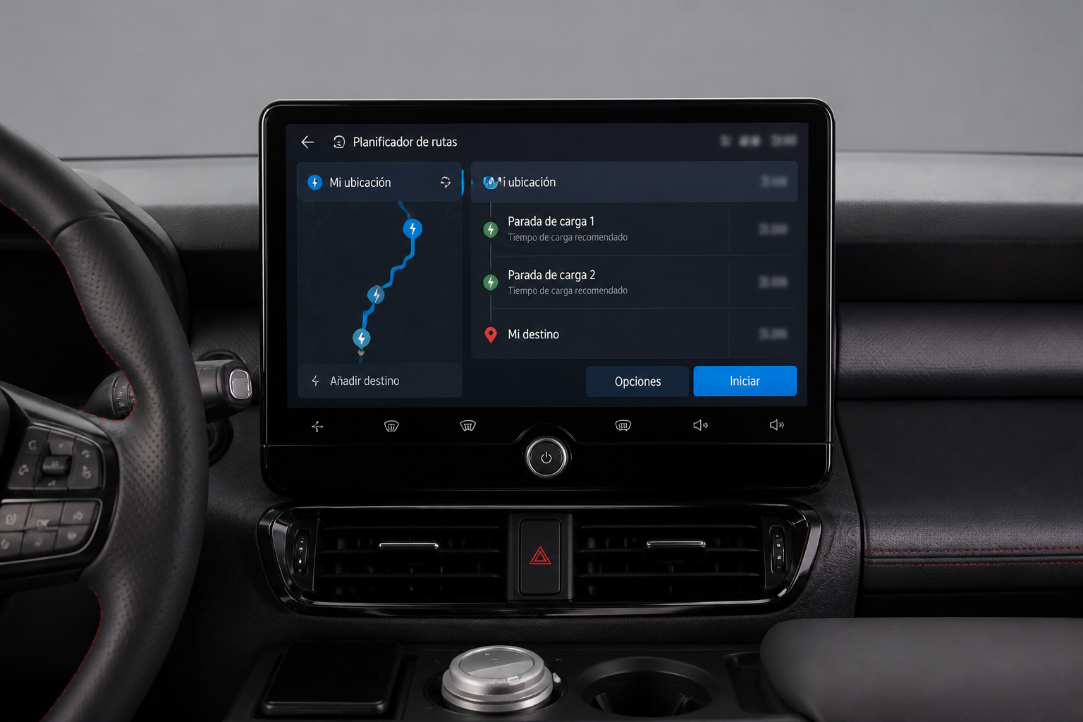 Pantalla central del habitáculo mostrando un planificador de rutas para eléctricos con paradas de carga, con valores desenfocados