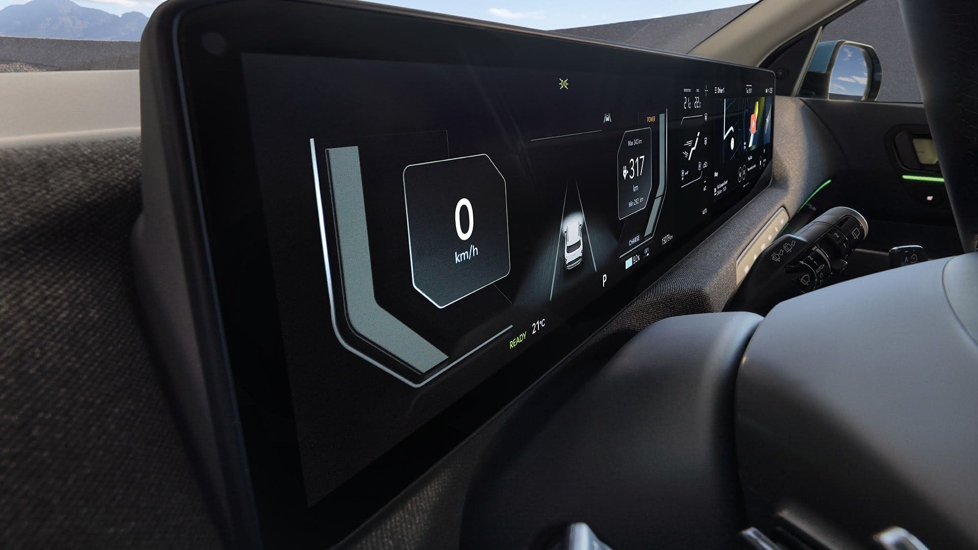 Cuadro digital del Kia EV2 con velocímetro e información de autonomía y batería