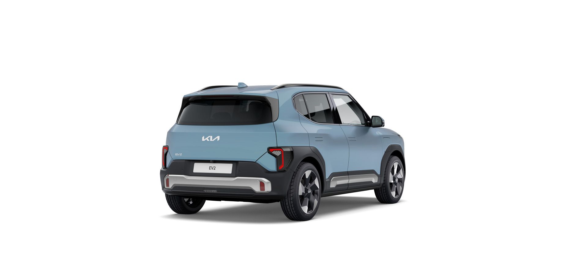 El vehículo Kia EV2 está configurado con un distintivo exterior azul claro, que le confiere una apariencia fresca y moderna. El diseño muestra un tono de color claro que resalta la
