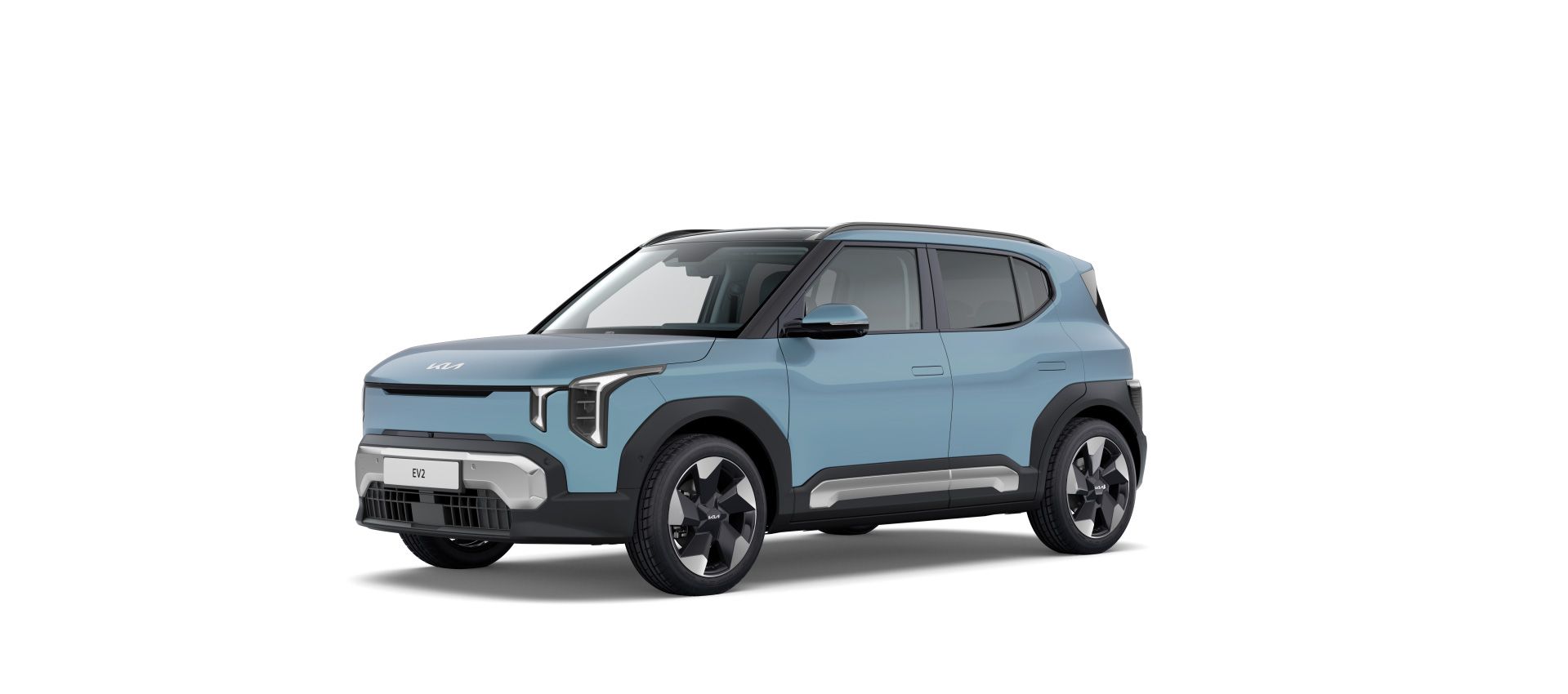 Kia EV2 en tres cuartos delantero mostrando su estética moderna y sus llantas multirradio