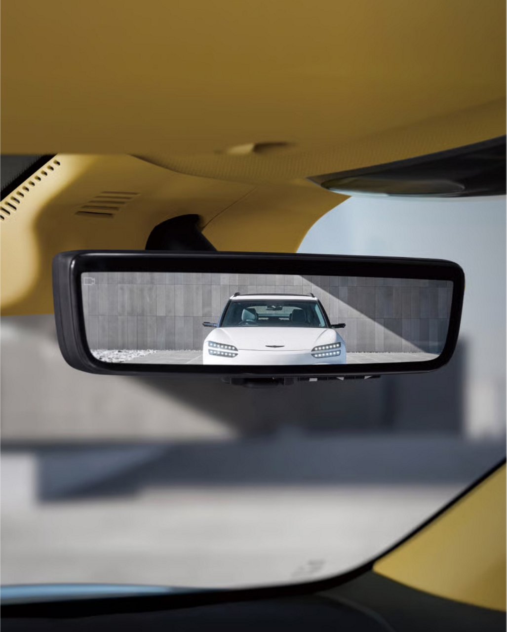 Retrovisor central del GV60 mostrando la imagen de un vehículo situado detrás