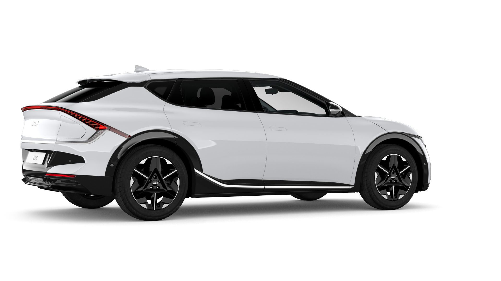 Vista tres cuartos trasera del Kia EV6 blanco en estudio, con la firma lumínica trasera visible