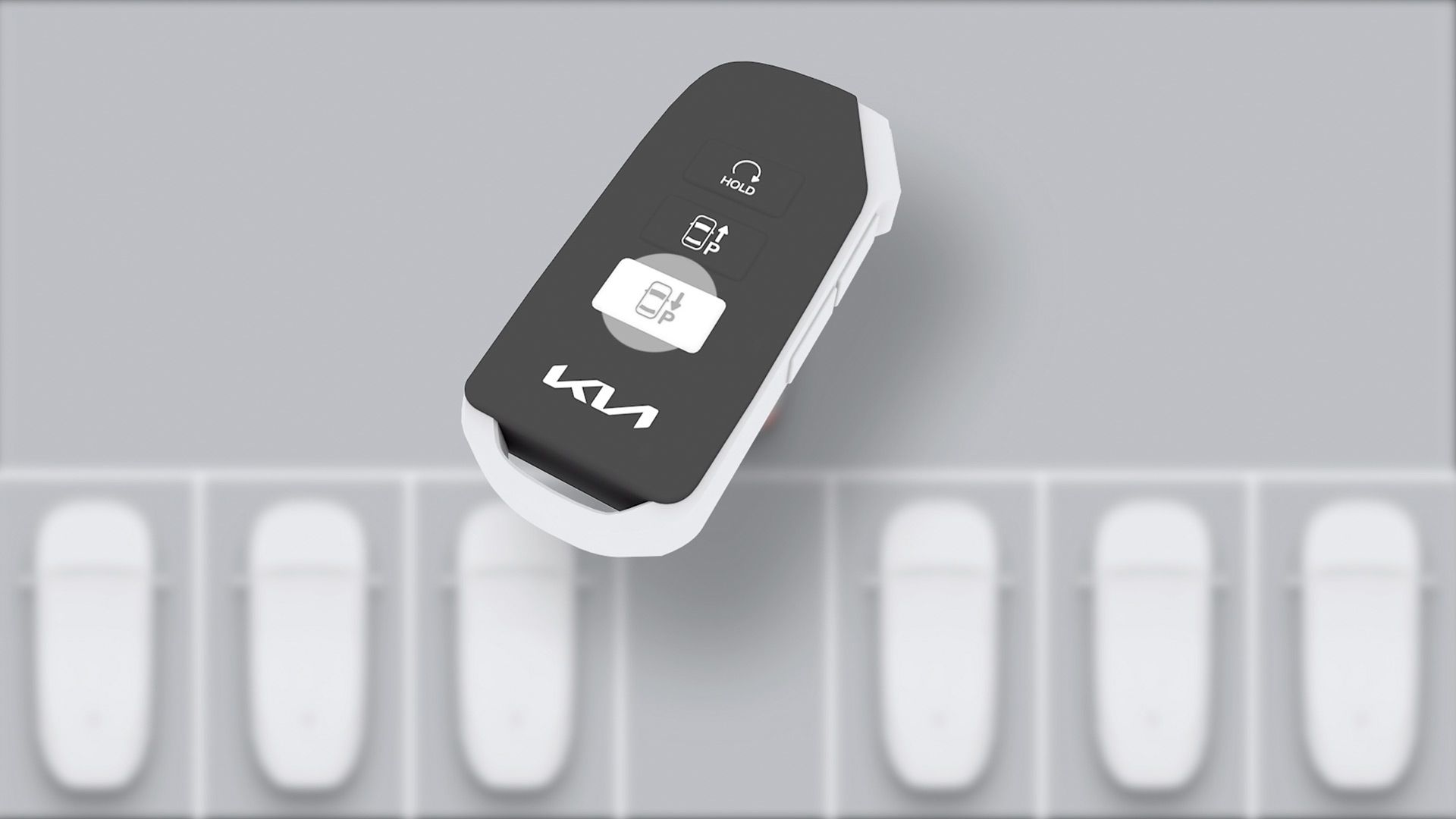 Llave inteligente de Kia con los botones de la función de aparcamiento remoto